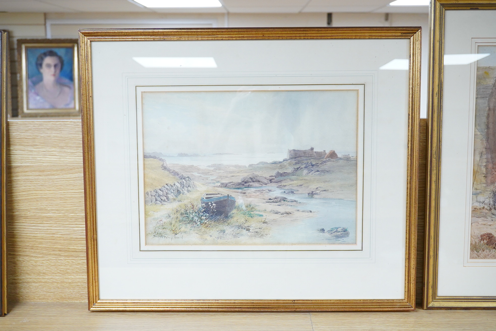Three watercolours comprising H. Percy Heard, Coastal view, B. Whitmore, Girl beside chickens and C. Gilles, Town scene before a cathedral, largest 36 x 19.5cm